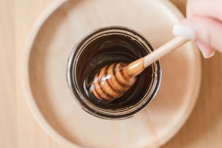 Close Up Photo of Honey on a Jar